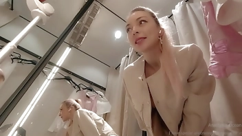 Online date in fitting room with open curtain. Public video call.