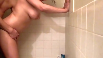 My boyfriend eats out my shaved pussy and fucks me hard standing up in the shower!
