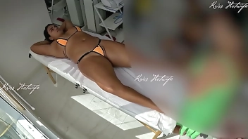 Giving a massage with a micro bikini stuffed in her pussy