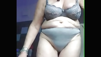 Granny fucks hairy pussy with cucumber