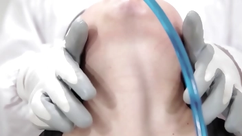 Make a sound with a ribbon wrapped around the neck, drinking water and swallowing