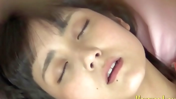 Masturbating asian babe climaxes