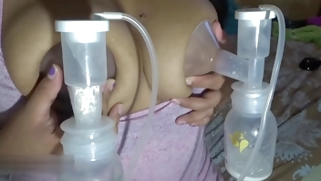 Milf Big lactating tits get breast pumped and milked