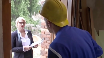 Sexy blonde babe gets facialized by a worker