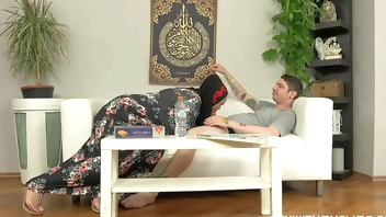 A busty woman in a hijab got a really hard gift