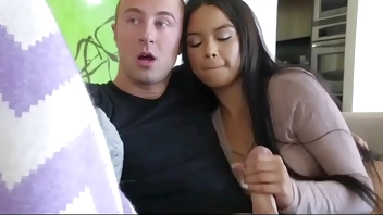 Horny Stepsis Teases Her Stepbrother's Dick Behind Stepmom Watching a Scary Movie - Familycum