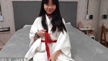 Baebi Hel opens legs wide trying on leather bondage gear