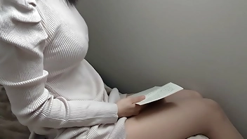 A cute girl reading in the morning