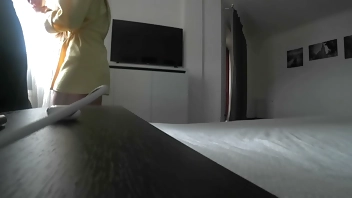 Wife cheats on her husband with an unknown man at home on the bed.Real unfaithful...