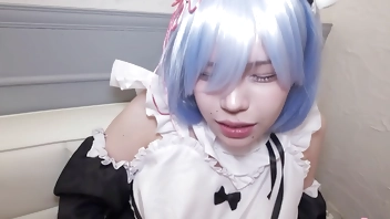 Asian maid Miu Akino rubbed with dildo on her clit while moaning on the couch.