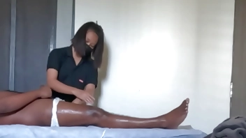 Jerking dick and flashing while taking body massage from a cute girl