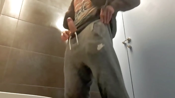 Sexy and Risky masturbation in a public bathroom