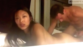 Exchange student from Asia getting extra lesson in teachers bed