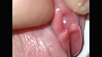 Hiden behind her gorgeous cameltoe I found her tiny clit I play with till she cums