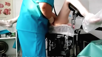Exam blonde on gyno chair