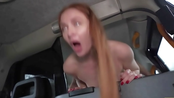 Fake Taxi Redhead MILF in sexy nylons rides a big fat dick in a taxi