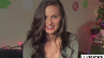 Lily tells us her horny Christmas wishes before satisfying herself in both holes