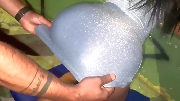 skinny girl does a gang bang on the street and gets a milk bath