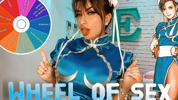 Chun Li cosplay from street fighter twerking her big ass in the wheel of sex game