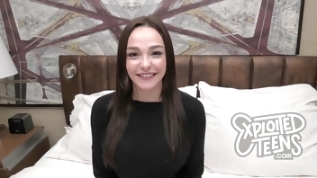 This cute model is 18 yrs old with some massive 32DD natural boobs