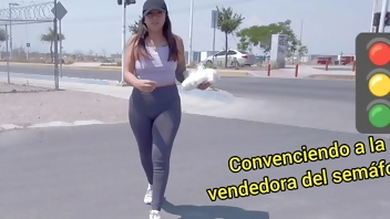 The traffic light saleswoman is seduced and gets into the car